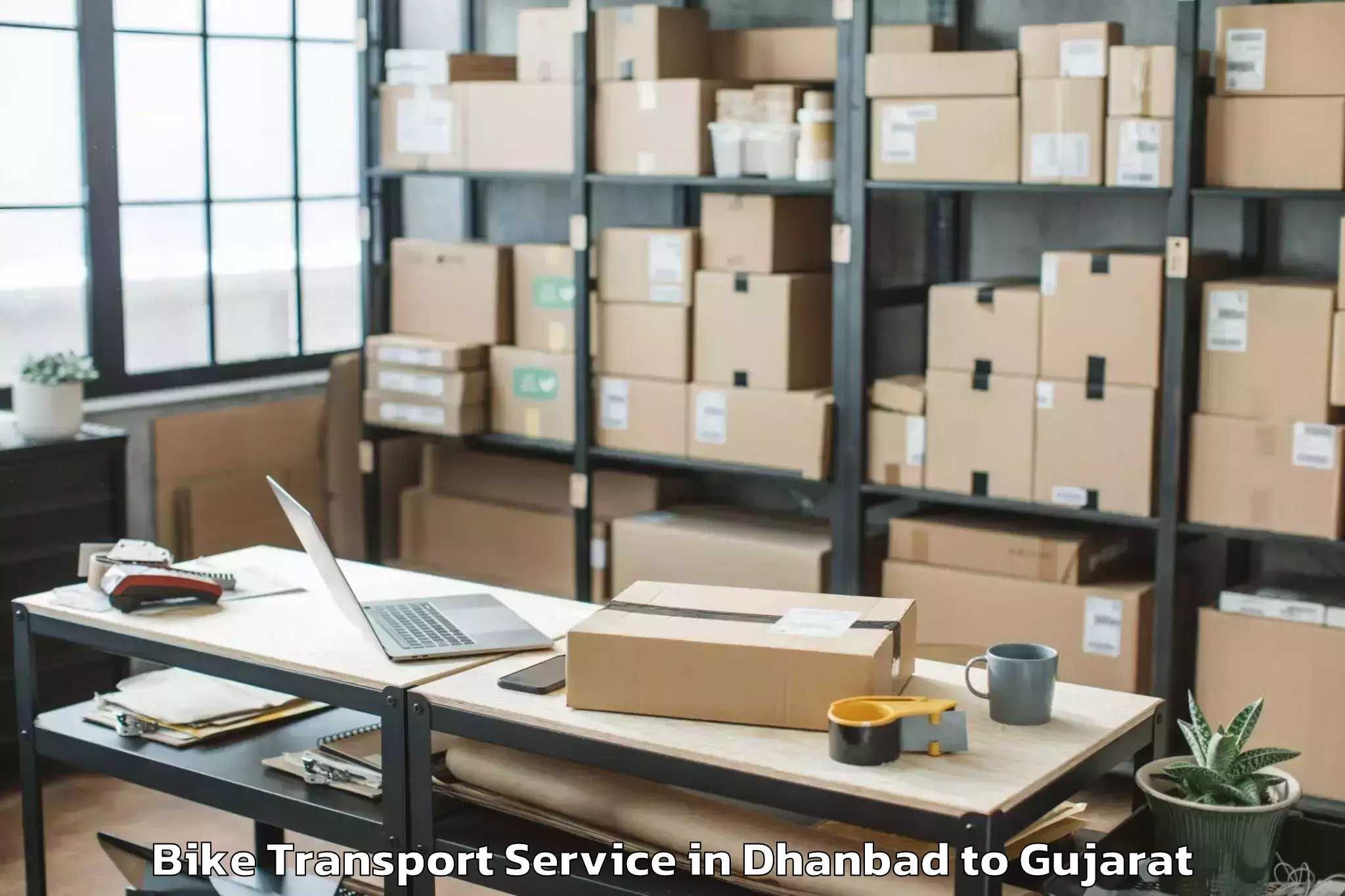 Professional Dhanbad to Nit Surat Bike Transport